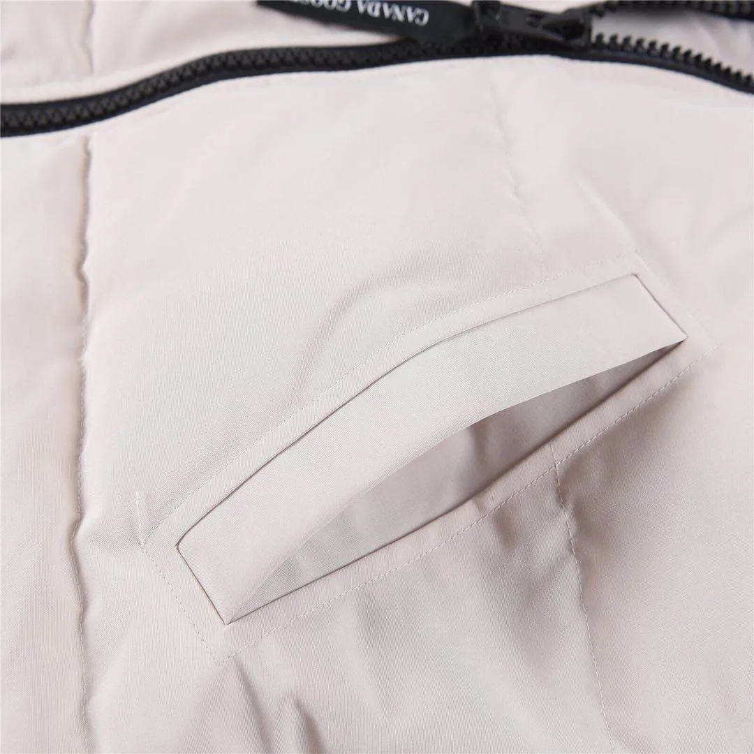 P760 Canada Goose Canada Goose #Mystique 3035LB extended parka down jacket/22 styles #women# ➖ Genuine synchronous anti-counterfeiting chip sensor! ➖ Imported 21-count polyester-cotton blended original fabric [last year’s 16-count/18-count hard fabrics have been completely eliminated, this year all use 21-count genuine synchronous fabrics, the soft mid-strap feels delicate and textured], genuine synchronous Feather-Light 10D waterproof coating fabric, made of 84.5 polyester fiber and 15.5 cotton, 100% the best feel in the entire network! ➖ The genuine official website is synchronized with the international standard 90 velvet! ➖ Using the best nylon lining with double double-layer sealing design, velvet-proof No. 7 needle + grid-filled down ready-made garments, there is 100% no so-called velvet running! ➖ The cuffs are designed with thickened seamless threads, and the collar and pockets are lined with top-quality polar fleece to keep you warm and comfortable! ➖ Yoshida YKK provides original custom-made electroplated sliders. YKK two-way lockable zippers are tight and smooth and will not peel off paint! ➖ 3M composite guarantees that the Velcro is the same as the original, durable, and all accessories and hardware are custom-made! ➖ Imported BEHRINGER embroidery machine to customize the 10,000-needle embroidery logo, 98% of which can be reproduced to restore the original logo. You can check and compare on the official website! ➖ The fur collars are all made of large pieces of Western Canadian blue wolf hide, ensuring that each fur collar is 13-15cm wide!  ⛔No slander, no exaggeration, professionalism because of focus!  SIZE: Purchasing agent grade: S M L [Attached: size chart] SIZE: Genuine grade: XXS XS S M L XL [Attached: size chart]